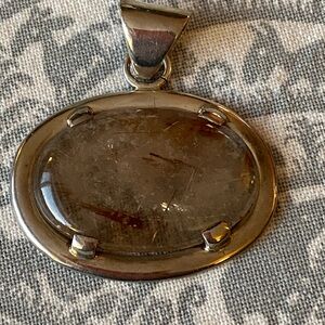 Elegant Silver Pendant with Clear Stone